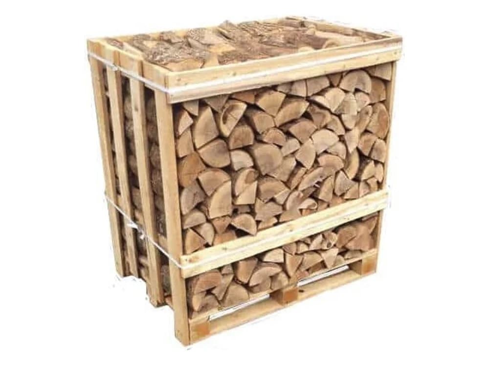 A slatted wooden crate packed with split ash logs, pale cut faces showing through the front of the crate